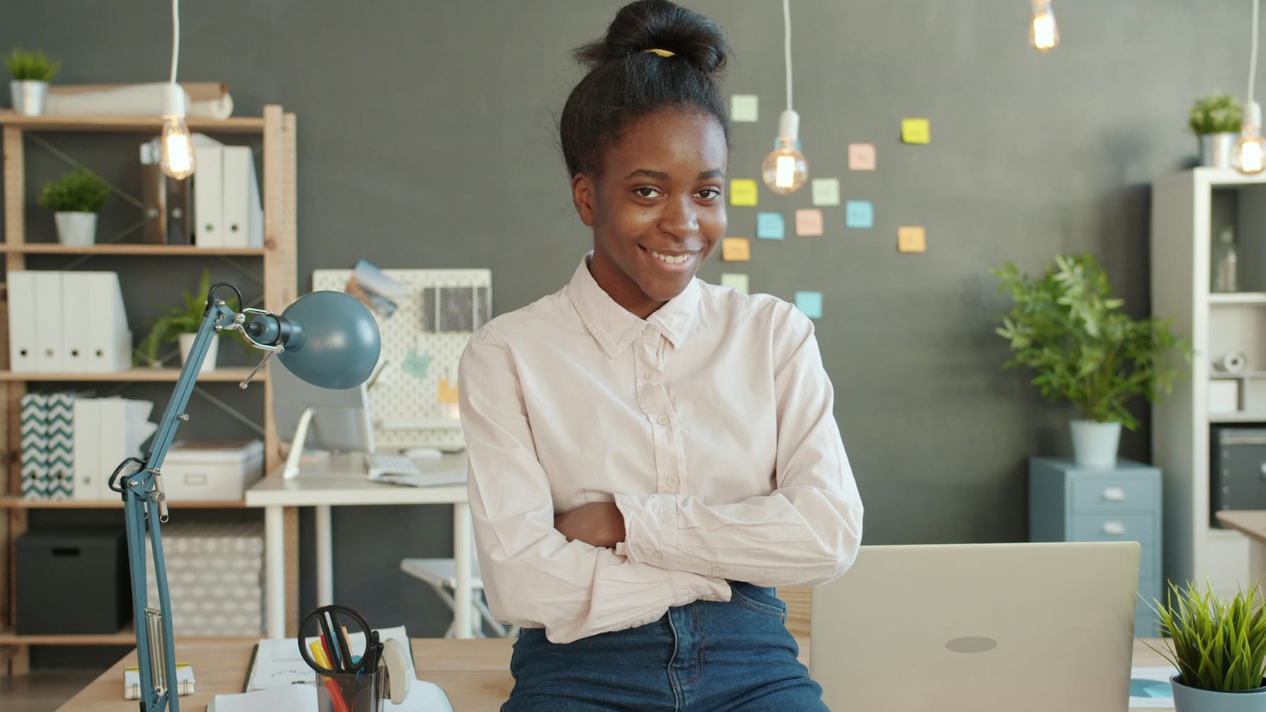 Young legal professional smiling in a modern office