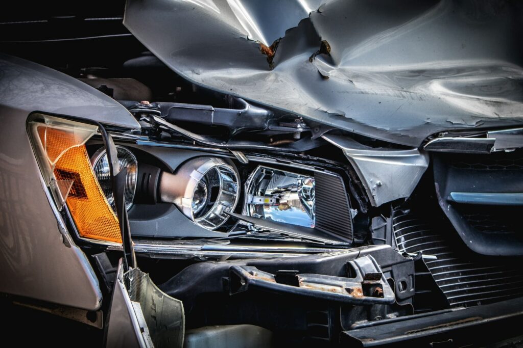Front of a car badly damaged in a road accident